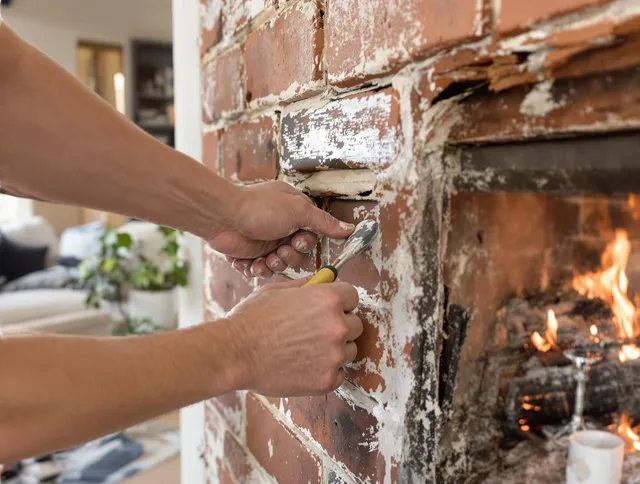 Routine fireplace repair by Longmeadow Chimney Sweep in Longmeadow, MA